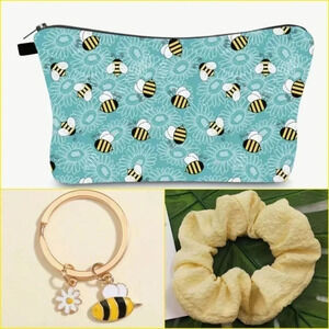 Bumble bee 🐝 cosmetic bag with matching keychain and ponytail.